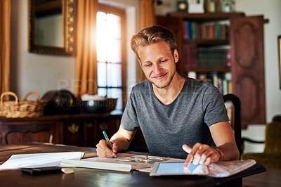 Buy stock photo College research, studying and a man with a tablet for home work, education and elearning. Smile, working and a male student with technology for information and planning for a project in a house