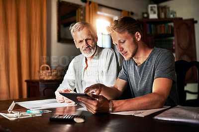 Buy stock photo Tablet, investment or retirement with a father and son in their home for savings, budget or finance planning. Accounting, money or insurance with a man helping his senior pensioner parent in the home