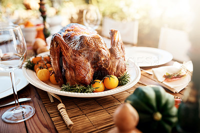 Buy stock photo Cropped shot of a roast turkey on a dining table on Thanksgiving