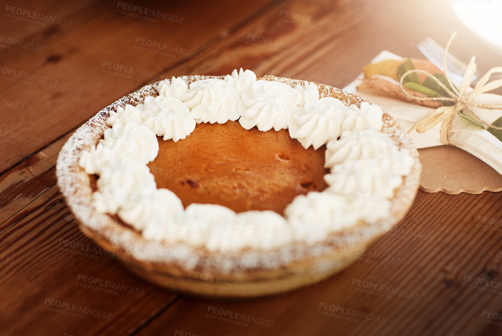 Buy stock photo Tablet, food and pumpkin pie as meal for thanksgiving with nutrition for health and celebration. Desk, baking and vegetable or vegan snack for health with cream for dessert, reunion and gathering