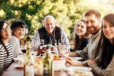 Buy stock photo Food, portrait and family eating together at table to celebrate holiday, Christmas or thanksgiving. People or friends group outdoor with senior parents and sharing lunch and drinks in summer garden