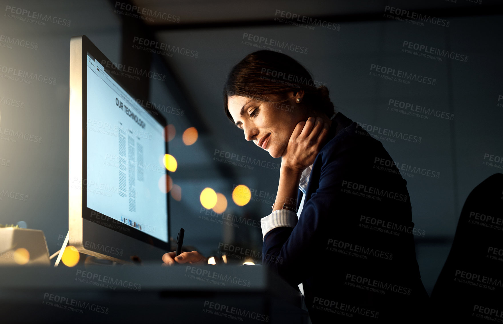 Buy stock photo Focus, desktop and businesswoman at night or employee in the office or thinking with pen. Corporate, dark and female manager contemplate or computer and stationery in the evening at workplace 