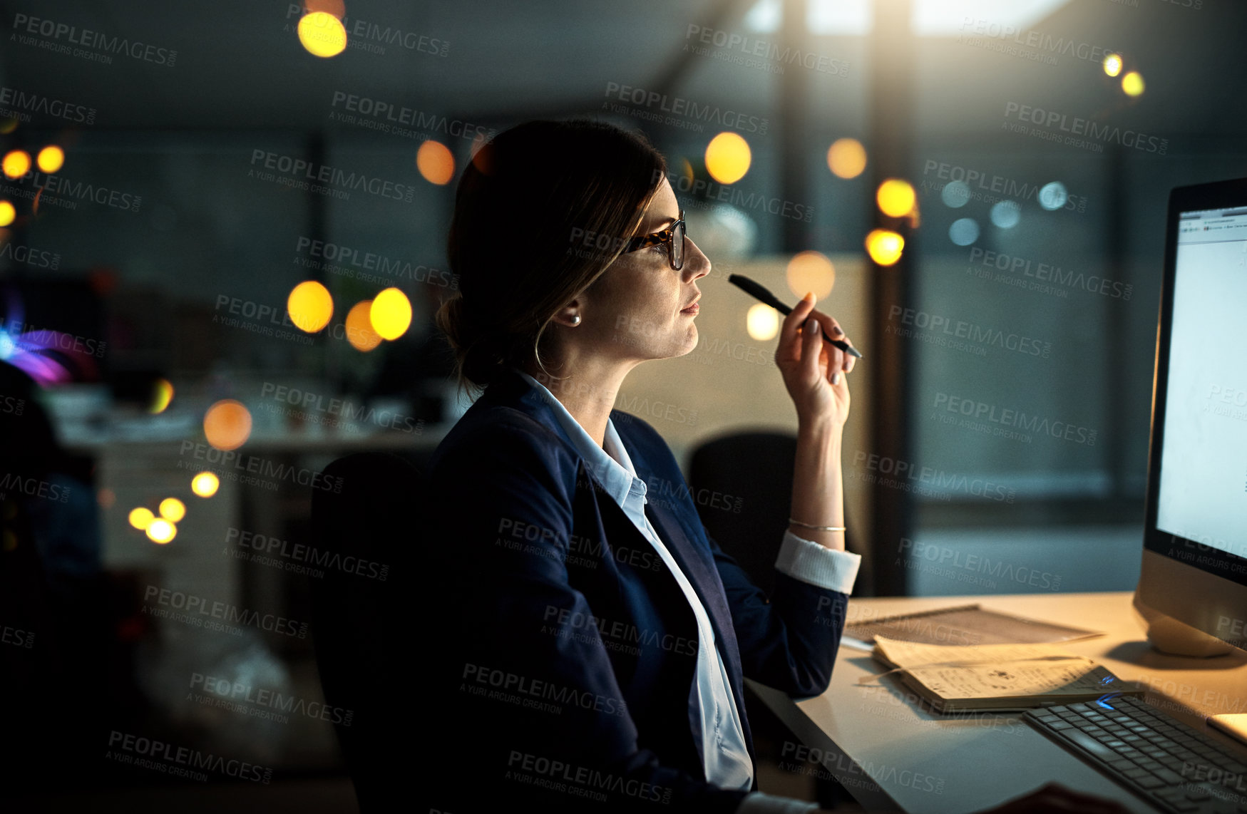 Buy stock photo Night, computer or business woman reading research or networking overtime on digital marketing strategy. Late, lens flare or focused employee online for project email deadline on internet in office