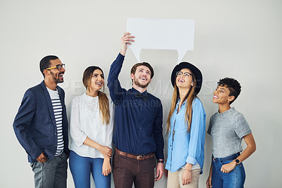 Buy stock photo Mockup space, smile and speech bubble with business people in studio for social media marketing. Collaboration, voice or we are hiring with man and woman employee group in office for communication