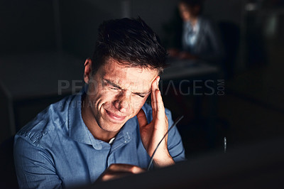 Buy stock photo Man, headache and business or dark in office, working late and worried or company deadline. Mental health, crisis and stressed or audit, corporate bankruptcy and night workplace or financial mistake
