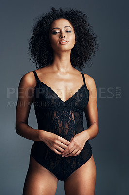 Buy stock photo Sexy woman, portrait and beauty with lingerie for fashion, style or sensual desire on a gray studio background. Young African, female person or attractive model in laced underwear or seductive outfit