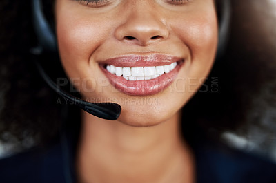 Buy stock photo Closeup shot of an attractive young female call center agent working in her office