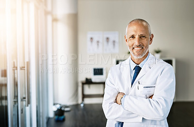 Buy stock photo Mature doctor, smile and portrait with arms crossed in hospital feeling proud from medical work. Healthcare, wellness and professional employee with happiness from health support and physician job