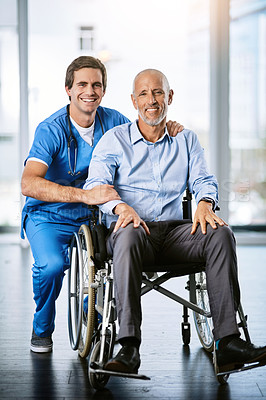 Buy stock photo Portrait of a male nurse caring for a senior patient in a wheelchair