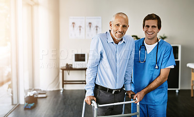 Buy stock photo Portrait of a male nurse assisting a senior patient with a walker
