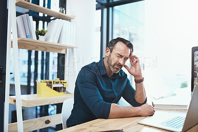 Buy stock photo Migraine, stress and businessman with burnout in the office while working on a project. Medical emergency, healthcare and tired mature professional male employee with a headache in the workplace.