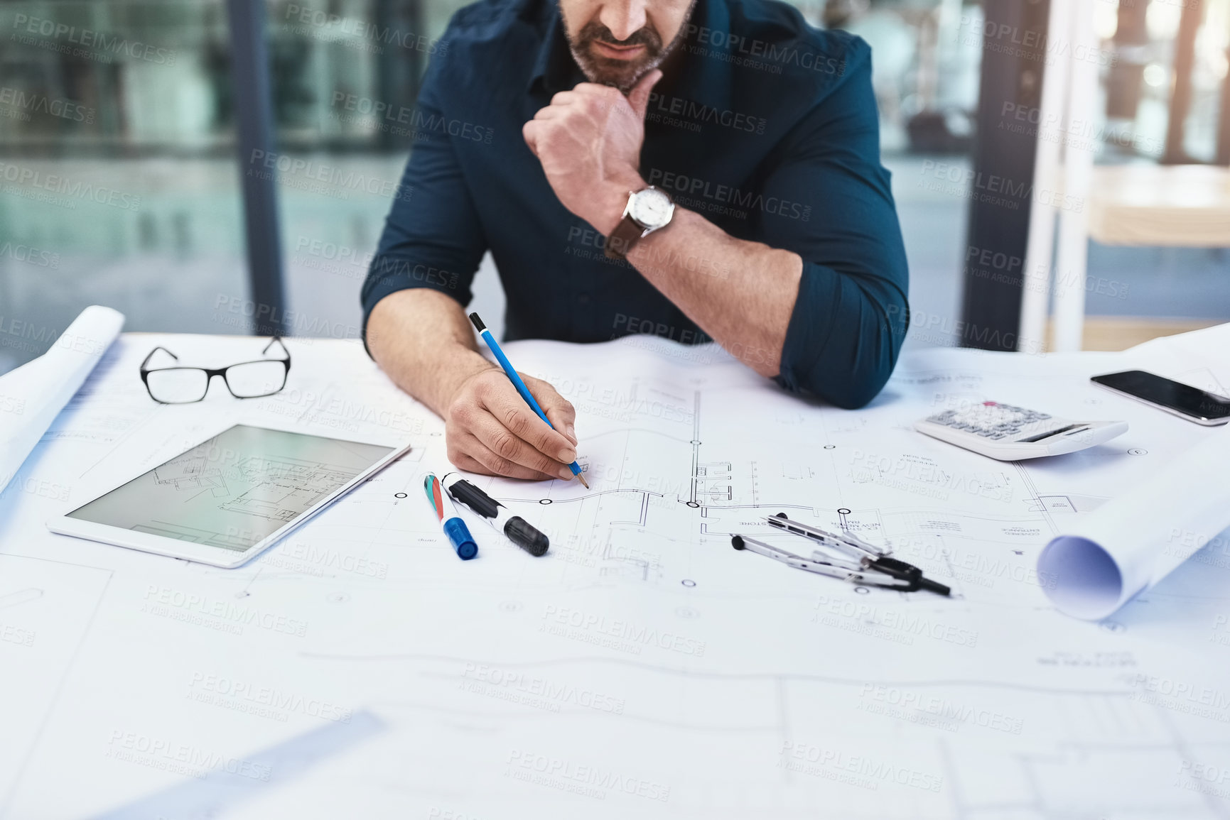 Buy stock photo Cropped shot of an unrecognizable male architect in his office