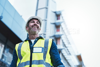 Buy stock photo Engineering, building and happy with man in city for planning, designer or industry. Architecture, project management or infrastructure with male contractor on construction site for inspection