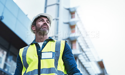 Buy stock photo Engineering, building and architecture with man in city for planning, designer or industry. Architecture, project management or infrastructure with male contractor on construction site for inspection