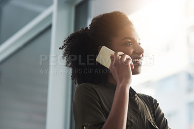 Buy stock photo Close up shot of a young businesswoman making a phone call in her office