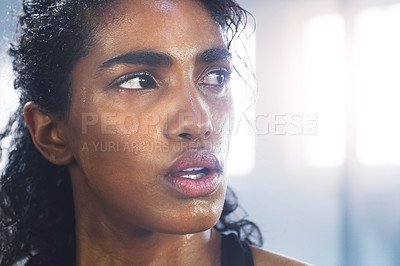 Buy stock photo Sweating, woman and breathing while taking a break from fitness, exercise and workout. Gym, Indian female person and serious face of an athlete after sports and wellness club training for health