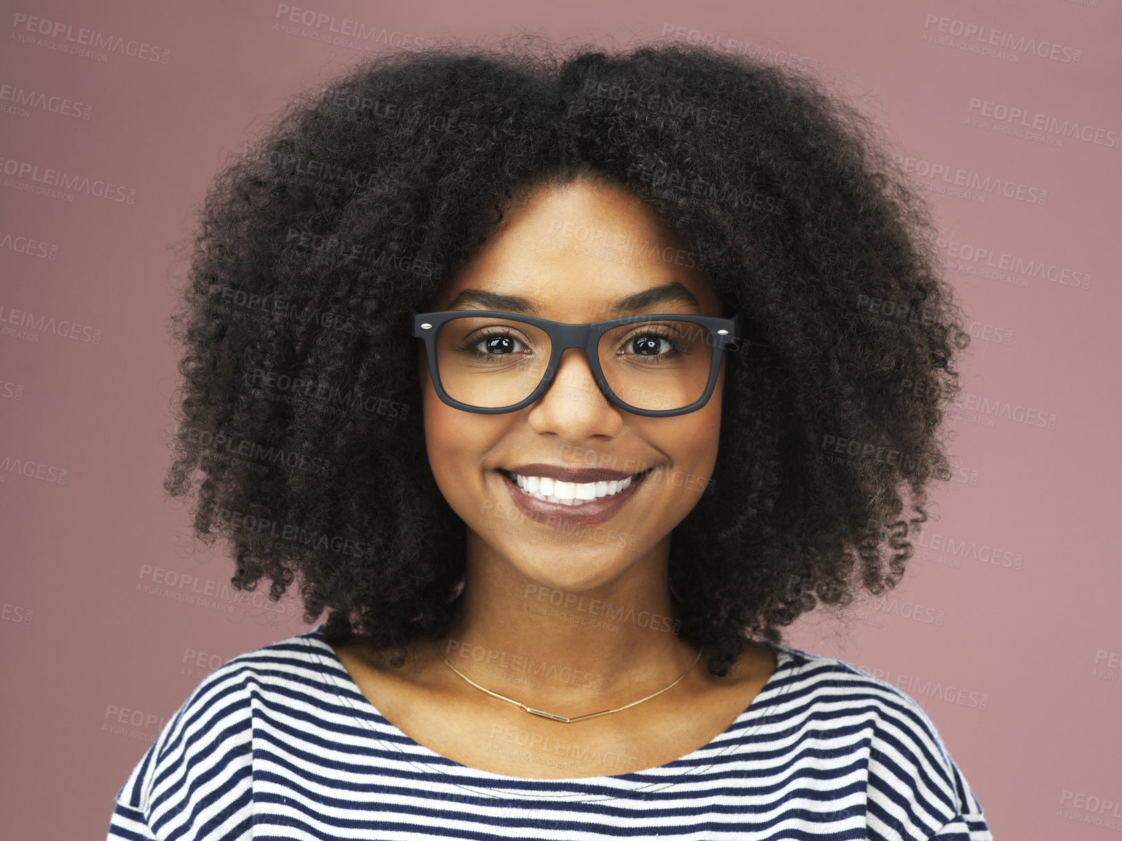 Buy stock photo Shot of a beautiful young woman posing with reading glasses against a pink background