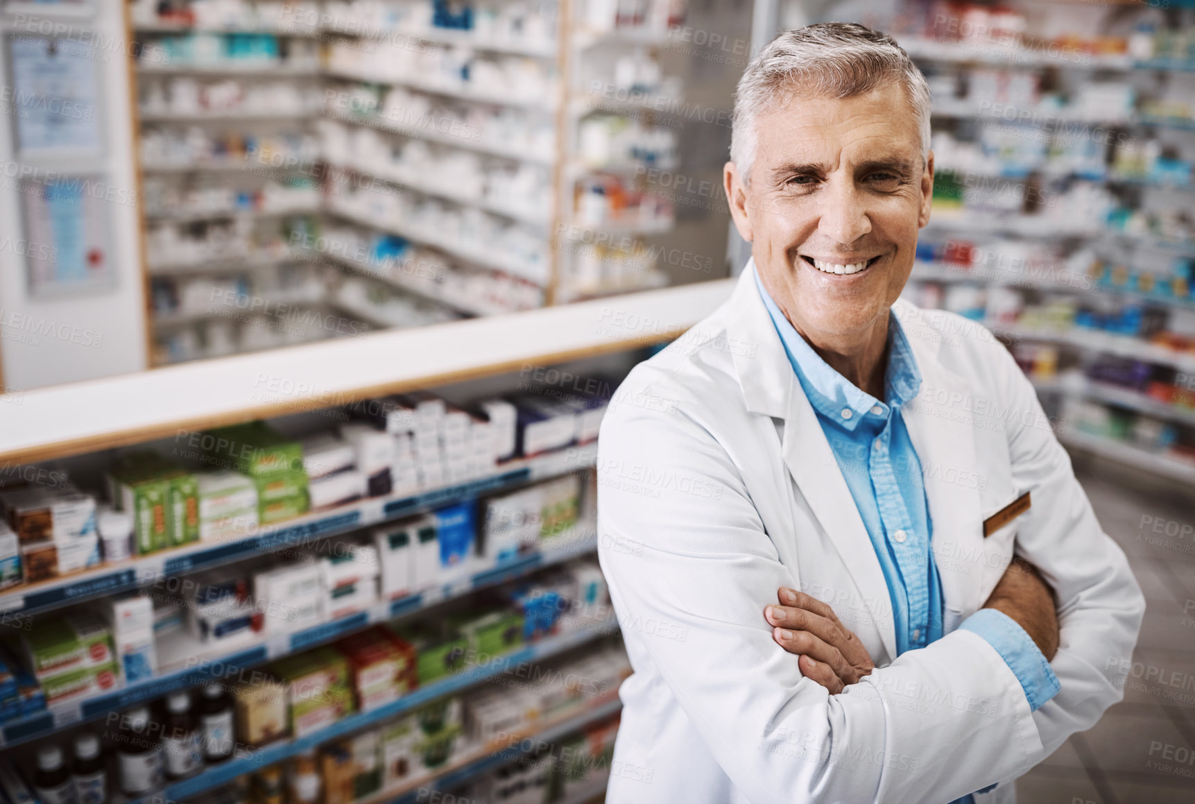 Buy stock photo Shot of a pharmacist working in a drugstore