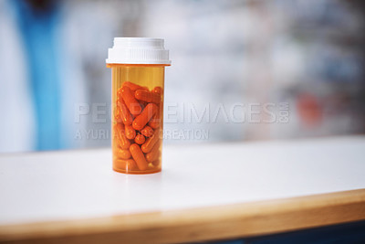 Buy stock photo Shot of medication on a counter in a drugstore