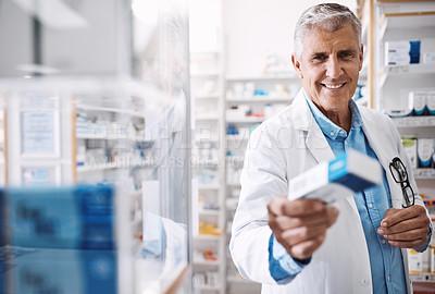 Buy stock photo Shot of a pharmacist working in a drugstore