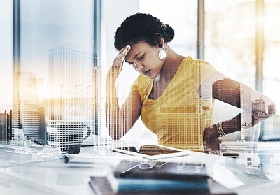 Buy stock photo Shot of a young designer suffering with a headache and back pain in an office