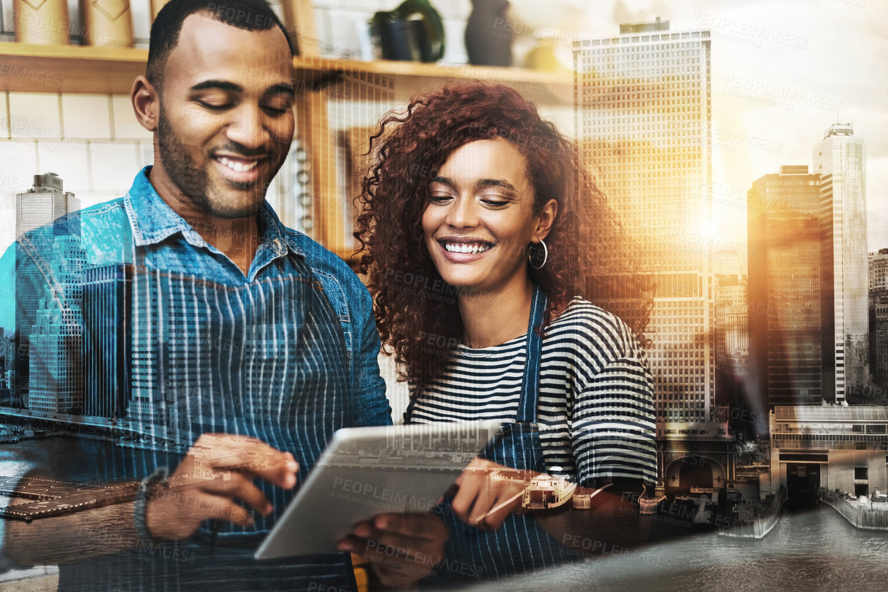 Buy stock photo Cropped shot of an affectionate young couple working on a tablet in their coffee shop