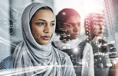 Buy stock photo Portrait of a group of young confident businesswomen standing in a row behind each other inside of the office during the day