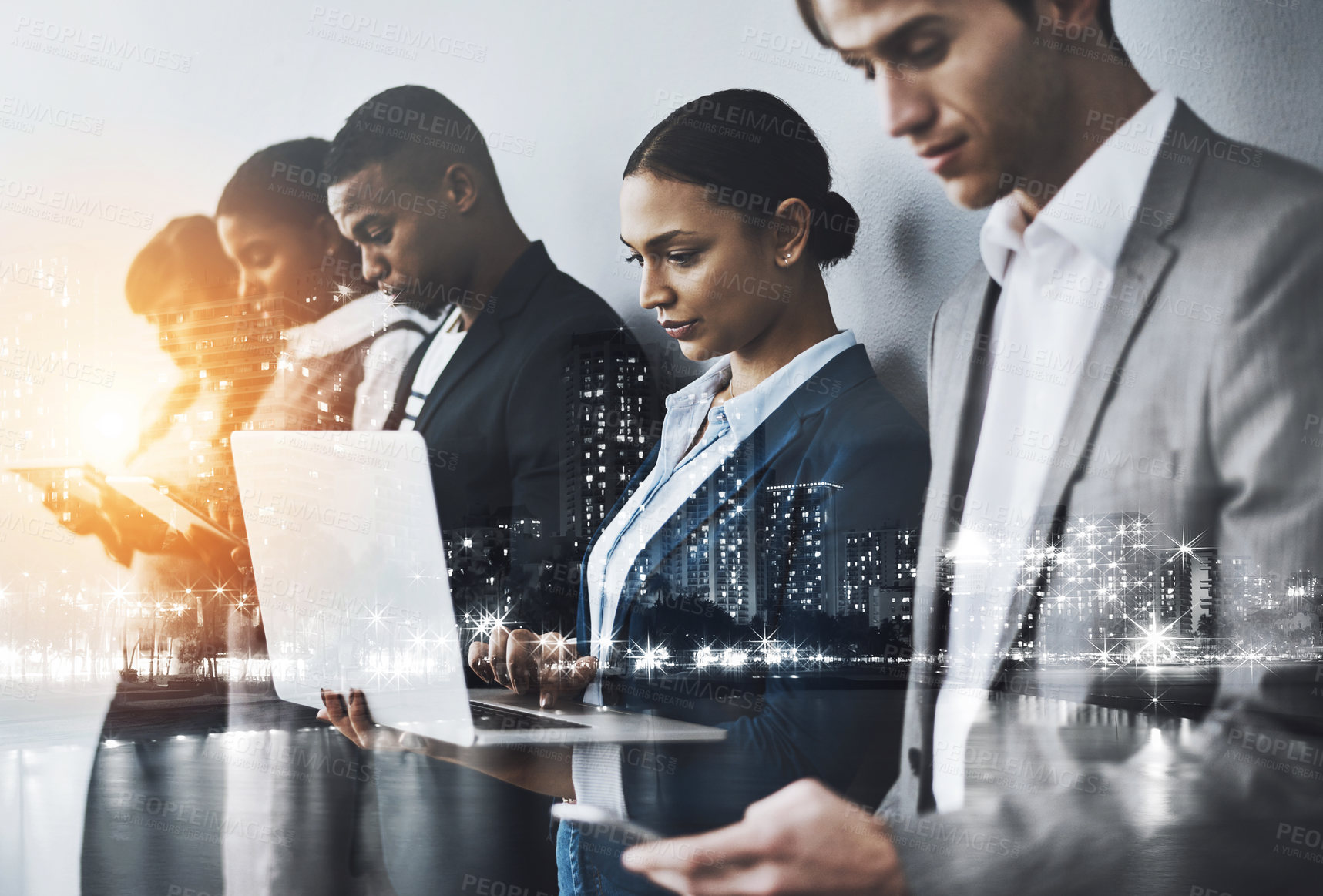 Buy stock photo Cropped shot of a group of young businesspeople waiting in line for their interviews