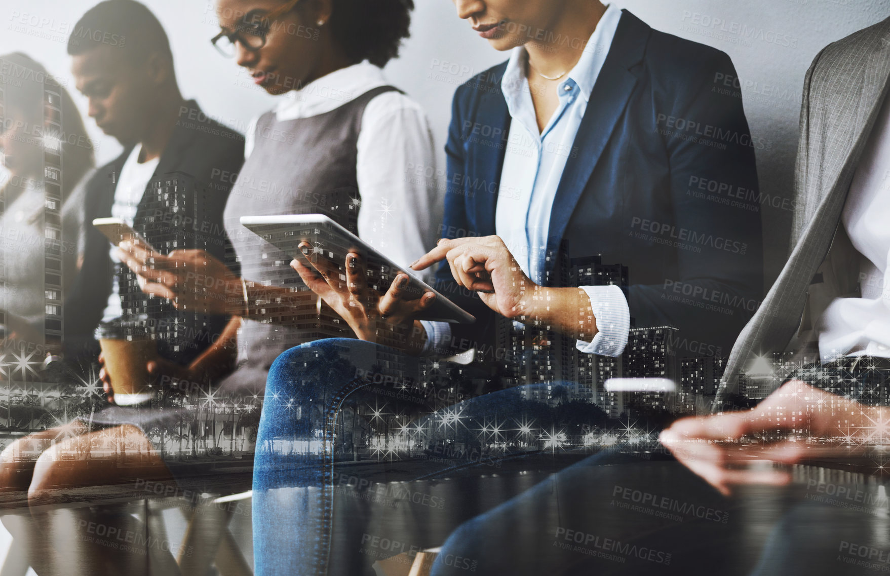 Buy stock photo Cropped shot of a group of young businesspeople waiting in line for their interviews