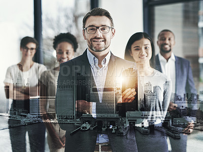 Buy stock photo Cropped portrait of a group of businesspeople standing with their arms crossed in the office