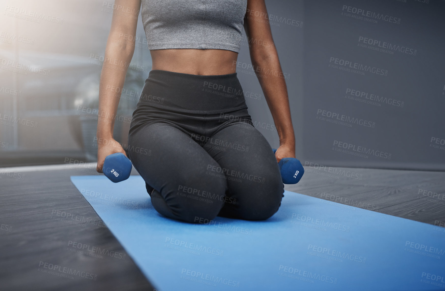 Buy stock photo Fitness, woman and dumbbells in home for exercise, yoga and workout on mat in apartment. Female athlete, pilates and training for health, wellness and muscle strength or arms with endurance in sports