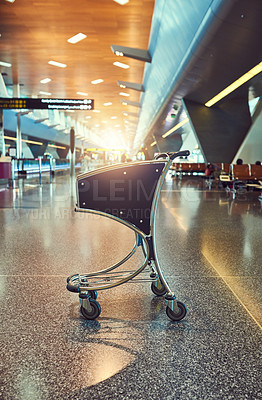 Buy stock photo Shot of an empty trolley in an airport