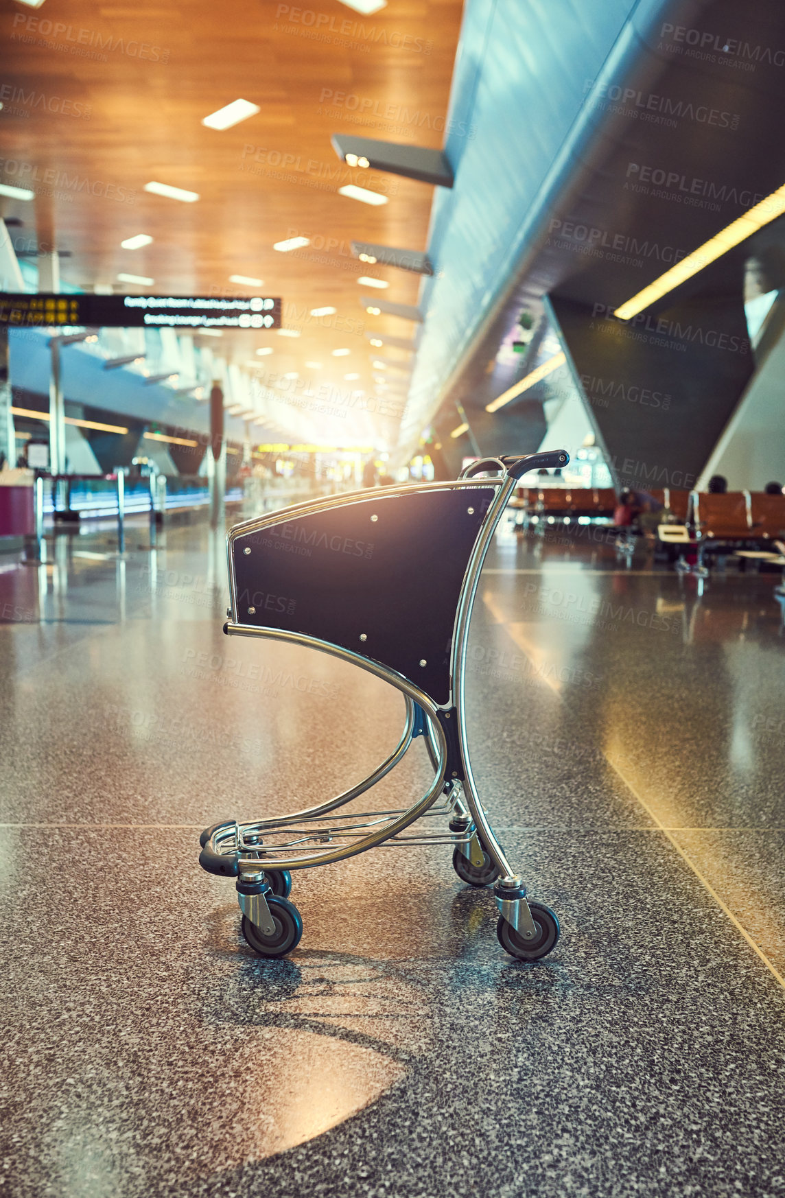 Buy stock photo Shot of an empty trolley in an airport