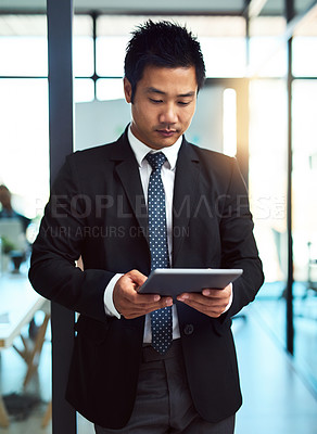 Buy stock photo Asian man, tablet and office for legal consultant, review policy and case draft for client. Male person, lawyer plan and online for judicial research, professional and verify legislation on website