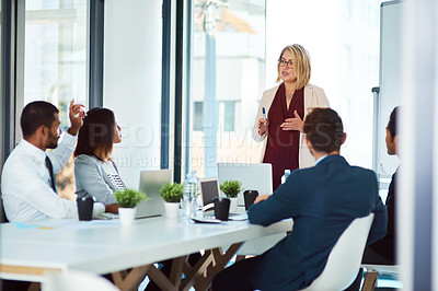 Buy stock photo Shot of corporate businesspeople having a meeting in the boardroom at work