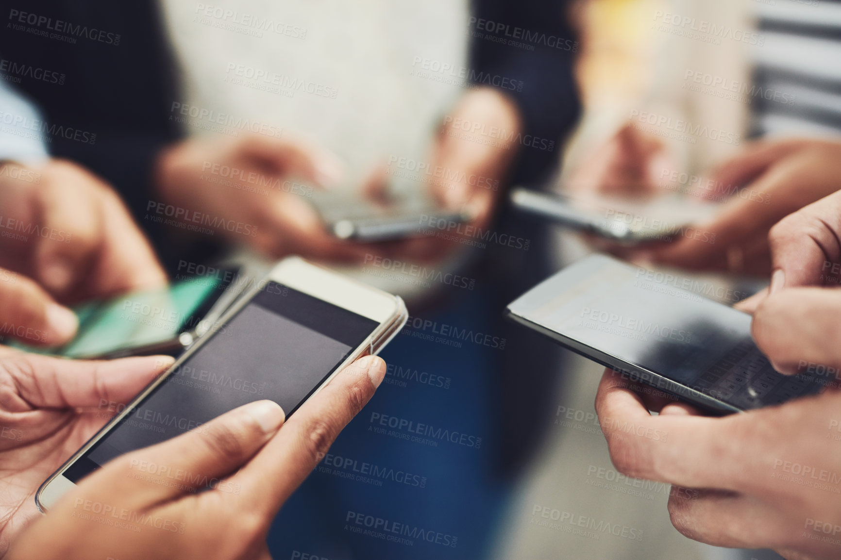 Buy stock photo Business people, phone and hands for communication, networking or social media together at office. Hand of group holding mobile smartphone in connection, data sync or sharing information at workplace