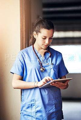 Buy stock photo Research, nurse and woman with tablet for reading email, healthcare report or telehealth in clinic. Scroll, medical surgeon and digital technology for hospital results, service and information online