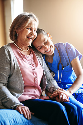 Buy stock photo Nurse, old woman and holding hands for comfort, hug and compassion with joy, healthcare advice and healing. Caregiver, pensioner or happy patient with consultation, house and empathy with gratitude