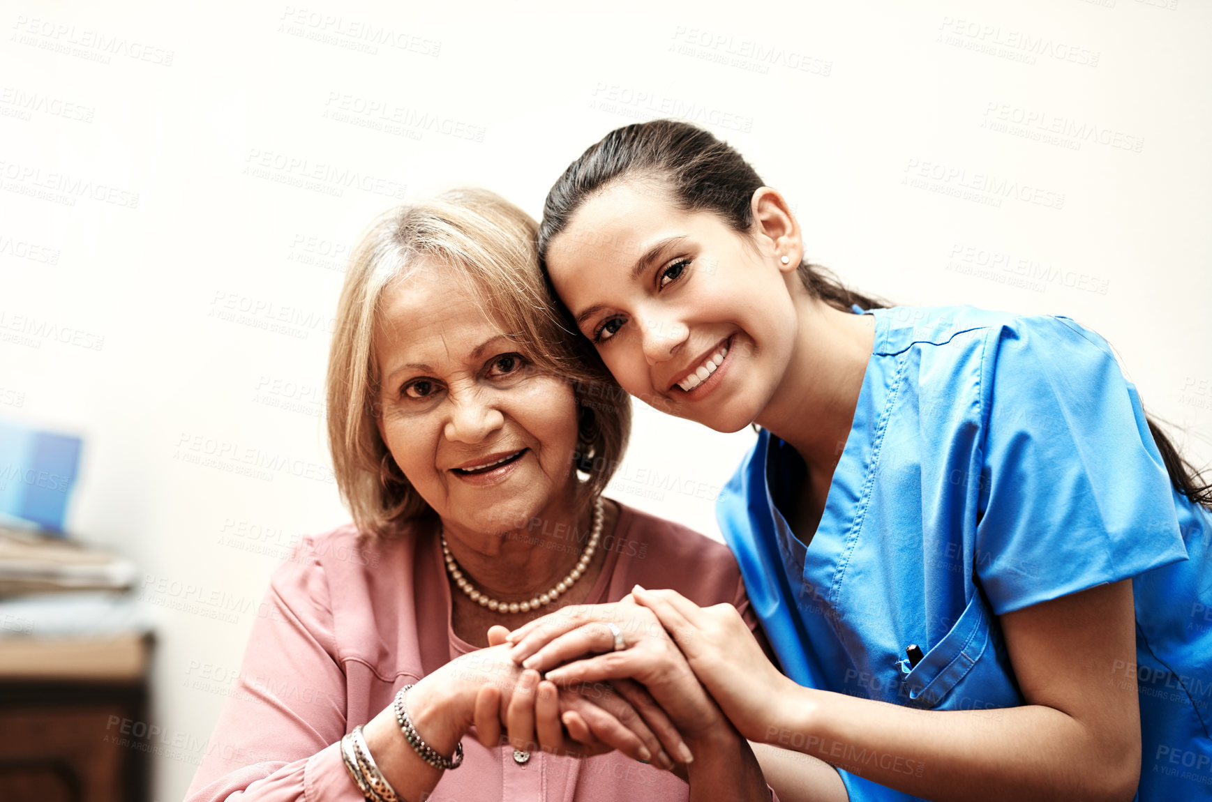 Buy stock photo Smile, holding hands and portrait with nurse and old woman for caregiver, occupational therapy and patient. Helping others, volunteer and healthcare with people in retirement home for medicine