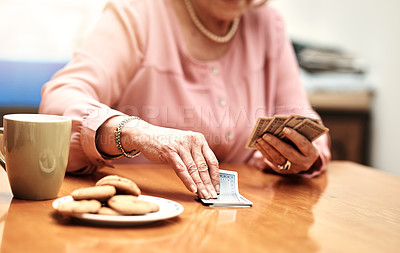 Buy stock photo Cropped shot of an unrecognizable senior woman in playing cards in an old age home