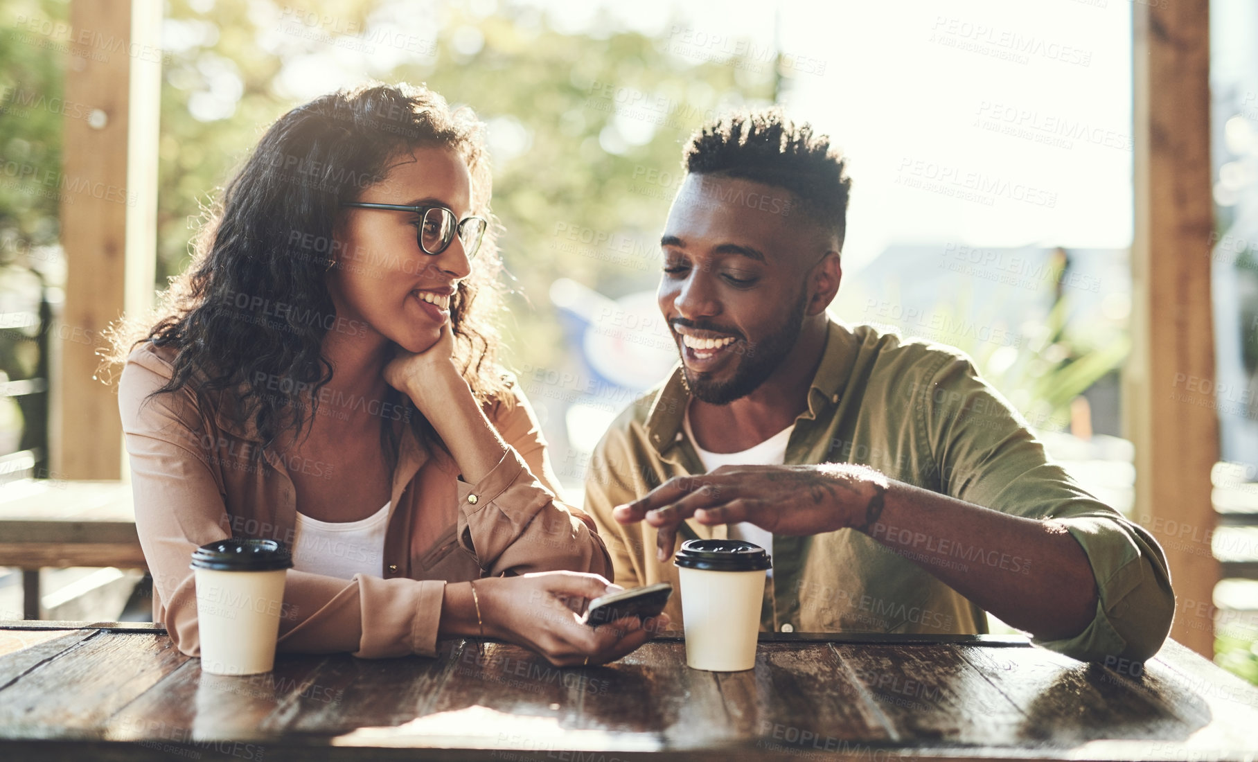 Buy stock photo Phone, man and woman in cafe with romantic smile, connection and scroll on social media. Flirt, love and happy couple in coffee shop together with mobile app for contact, online dating and bonding