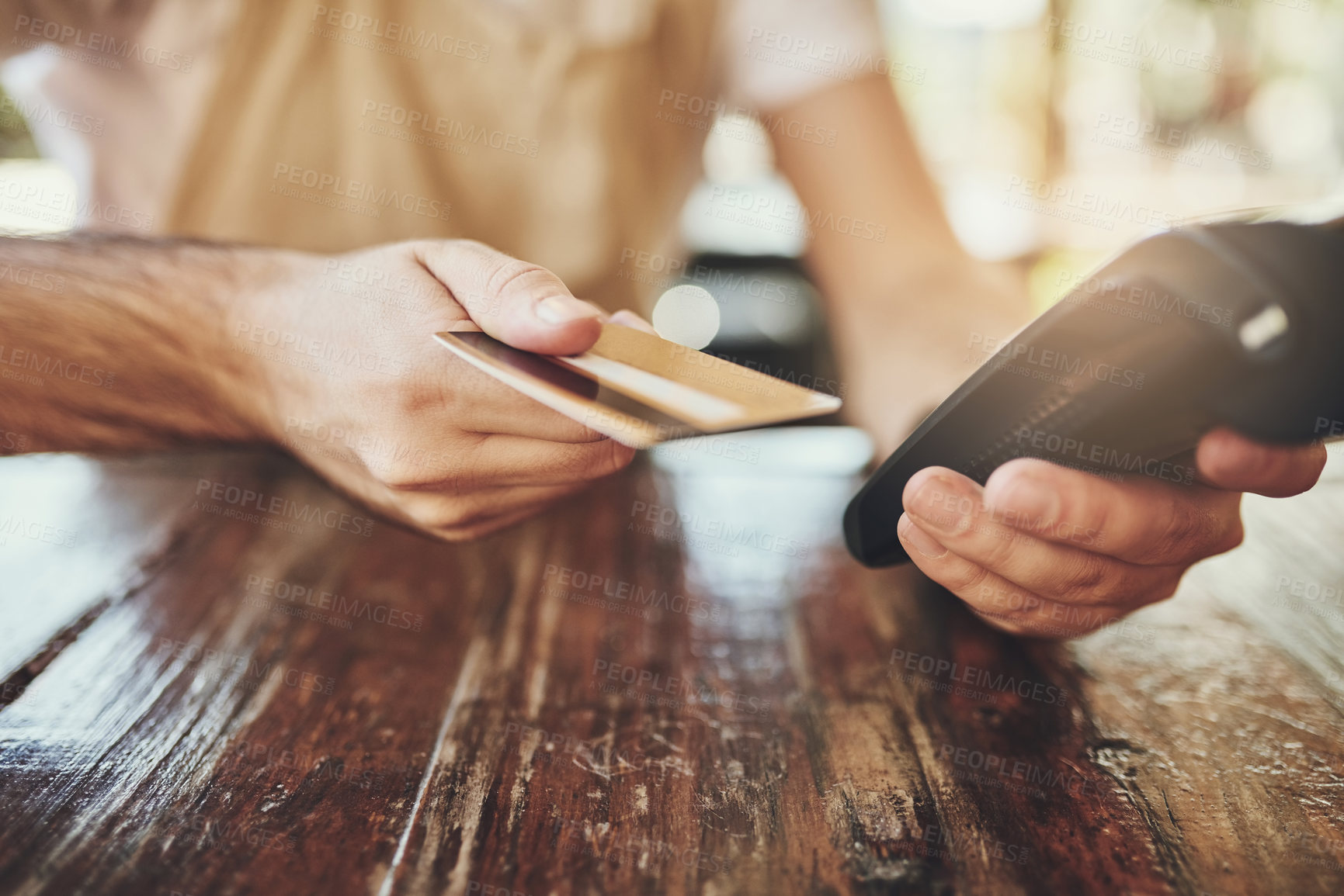 Buy stock photo Barista, credit card and pos terminal in cafe for payment by customer for waitress service. Finance, bill and nfc with person paying paperless using wireless technology in coffee shop or restaurant