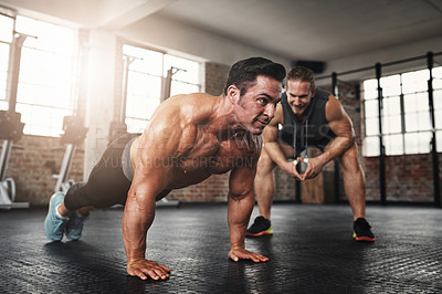 Buy stock photo Fitness, coach and male athlete doing push up exercise for strength, health and wellness. Sports, training and man doing bodybuilding workout or challenge with personal trainer for motivation in gym.