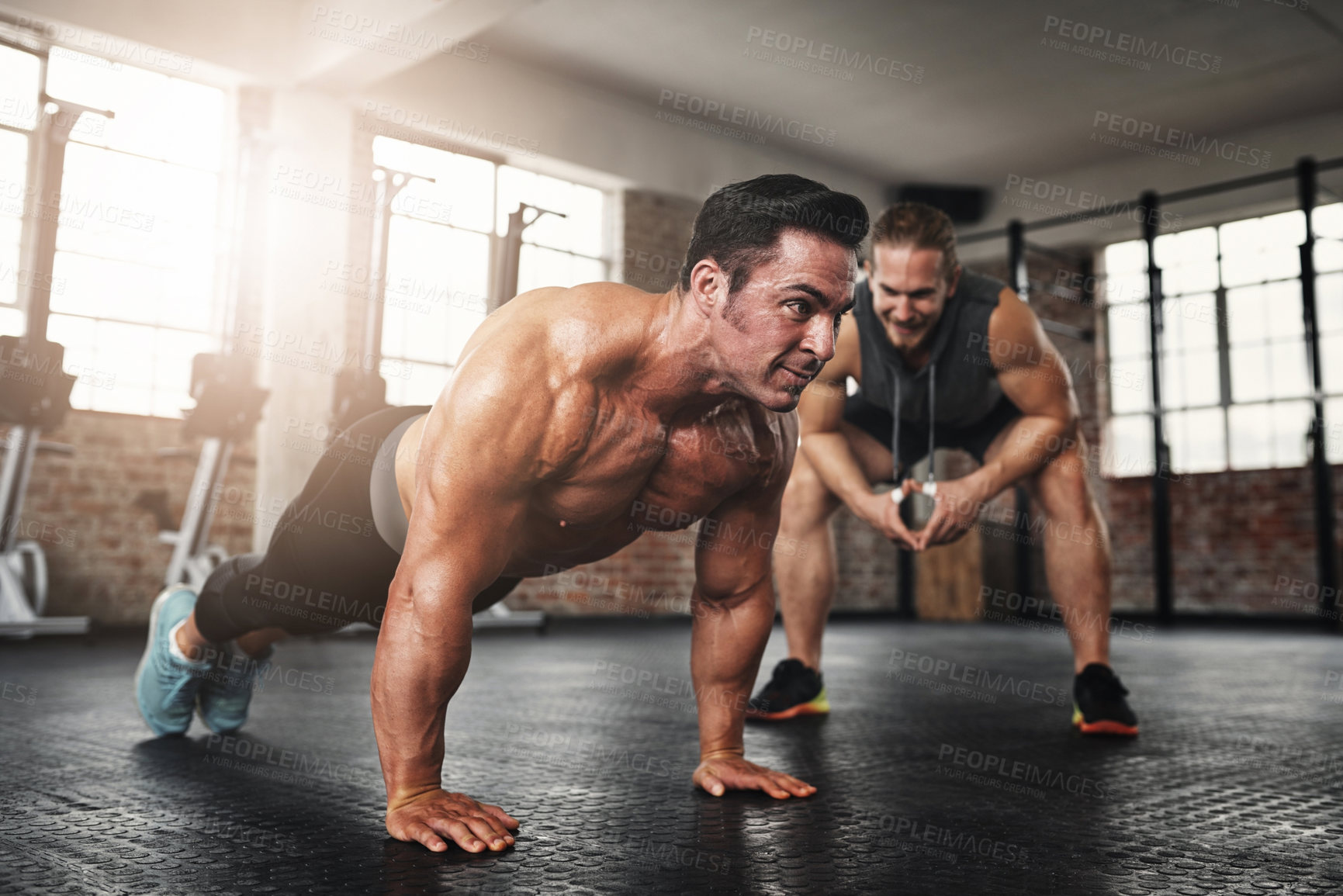 Buy stock photo Fitness, coach and male athlete doing push up exercise for strength, health and wellness. Sports, training and man doing bodybuilding workout or challenge with personal trainer for motivation in gym.