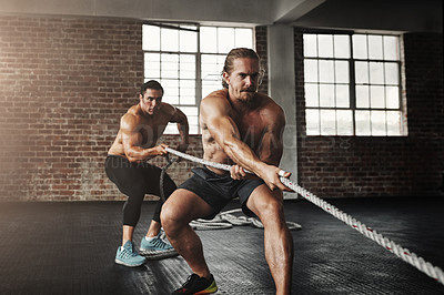 Buy stock photo Man, training and exercise in gym with rope for fitness, workout and muscle growth, agility and power. Body builder, pull and tug of war in sports club for strength, health and speed with resilience