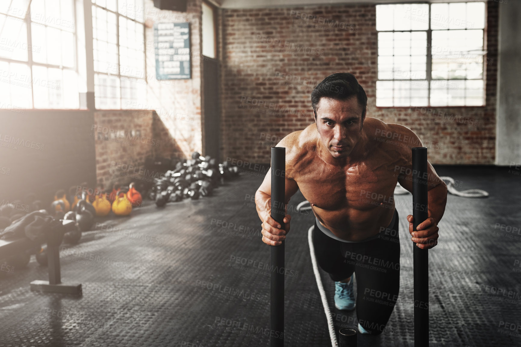 Buy stock photo Man, sled and exercise in gym for health, workout and muscle growth, agility and power with energy. Body builder, weights and training in sports club for fitness, strength and speed with resilience