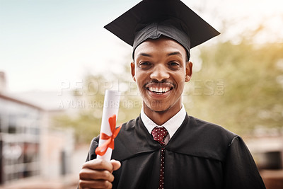 Buy stock photo Graduation, black man and portrait of a university student with a diploma and happiness outdoor. Male person happy to celebrate college achievement, education success and future at school event