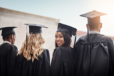 Buy stock photo Rearview shot of students on graduation day from university