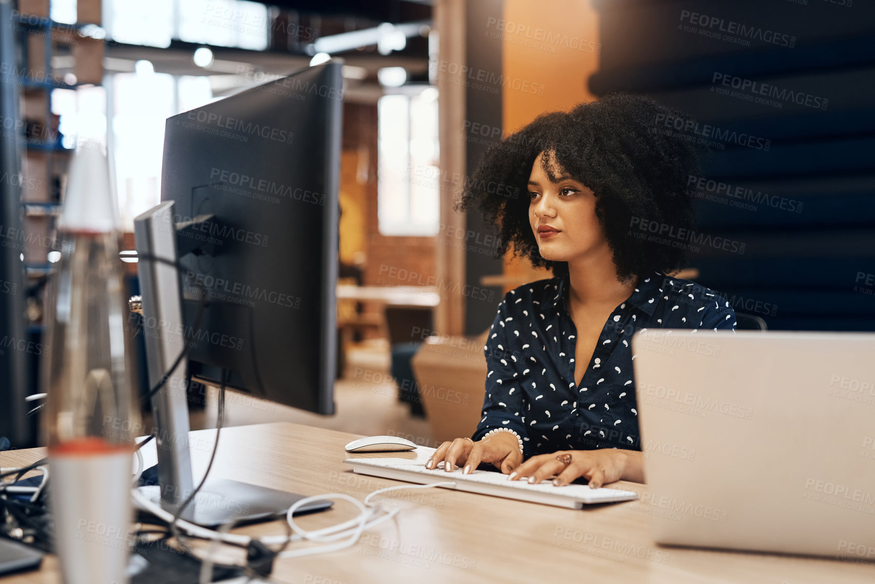 Buy stock photo Woman, typing and computer for working in office, serious and keyboard for journalist, research and writing. Workplace, employee and person with laptop, planning and project for headline of article