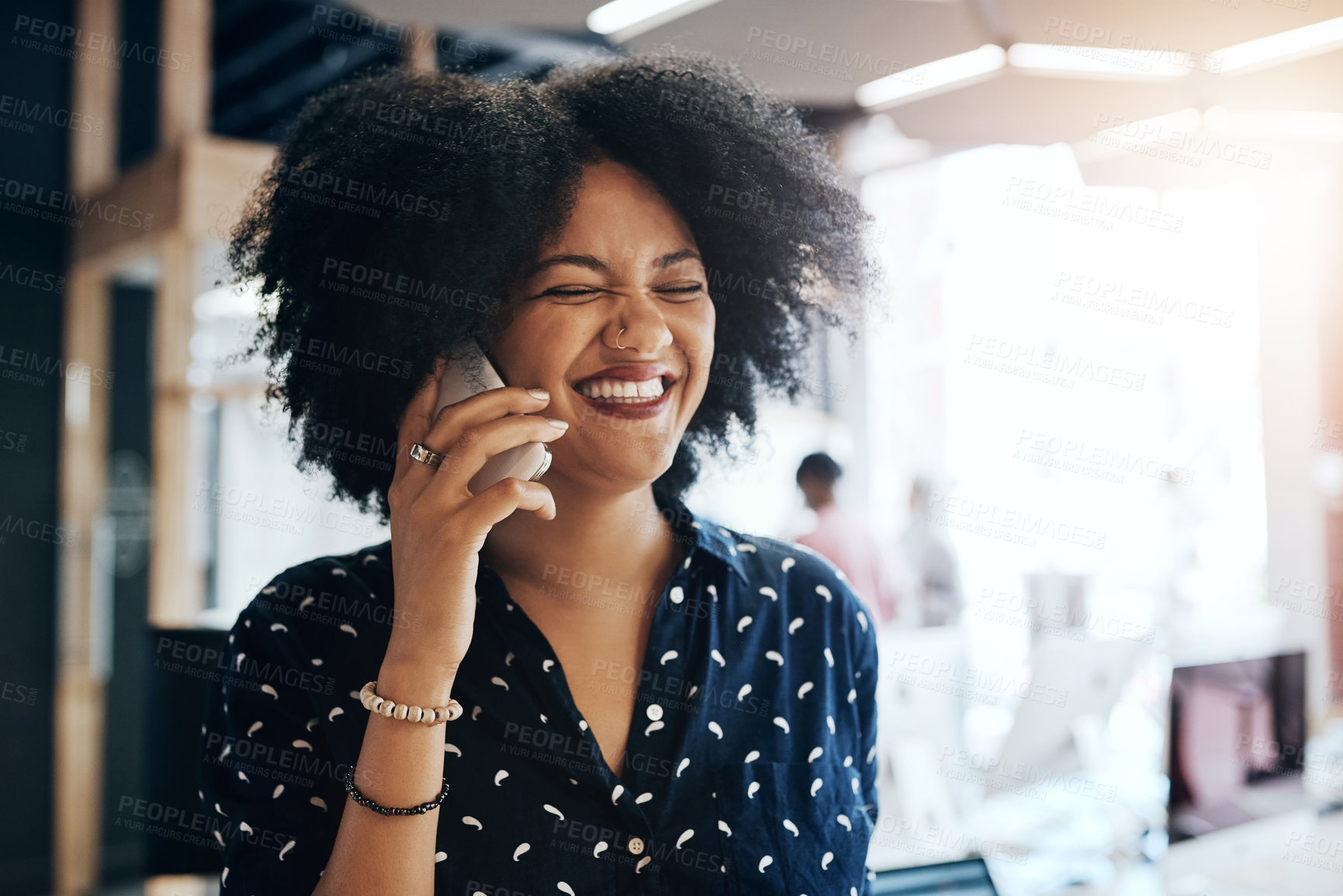 Buy stock photo Black woman, laughing and business with phone call for funny joke, discussion or proposal at office. Young African, female person or employee with smile for friendly conversation on mobile smartphone